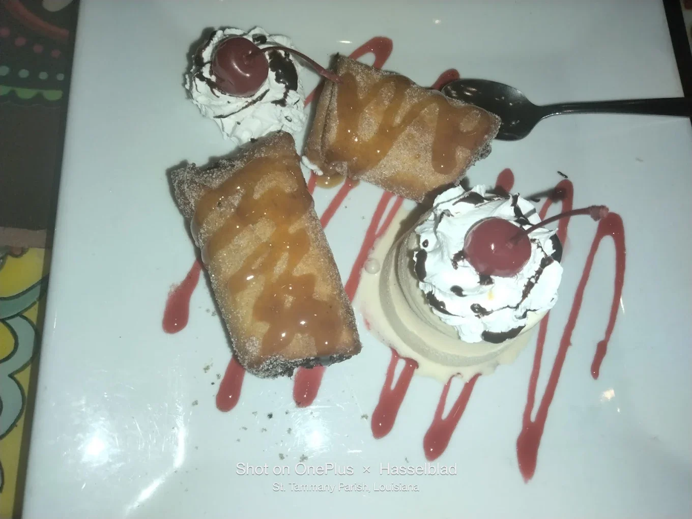 Banana Cheesecake Chimichanga - A golden-fried flour tortilla filled with creamy banana cheesecake, drizzled with caramel sauce and topped with whipped cream — a Mandeville favorite!