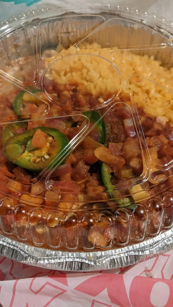 Carne Asada - Grilled marinated steak served with rice, beans and tortillas