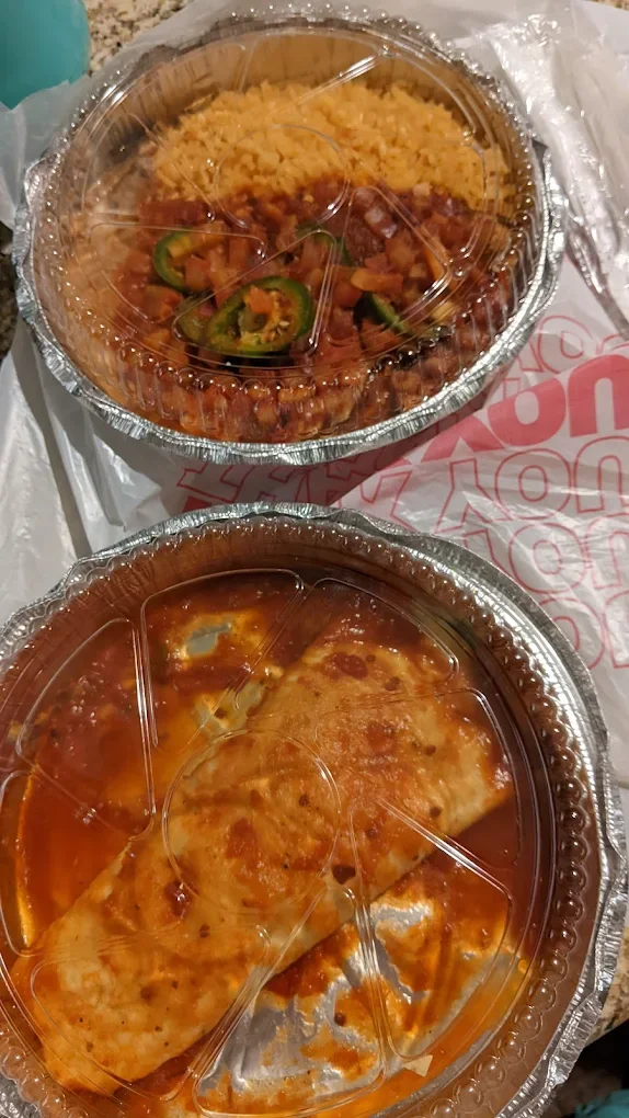 Pescado a la Mexicana - Fresh fish cooked Mexican-style with tomatoes, peppers and onions