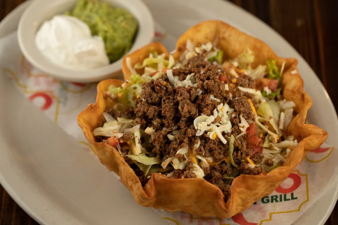 Taco Salad in Tortilla Shell - Taco salad served in a crispy fried tortilla bowl